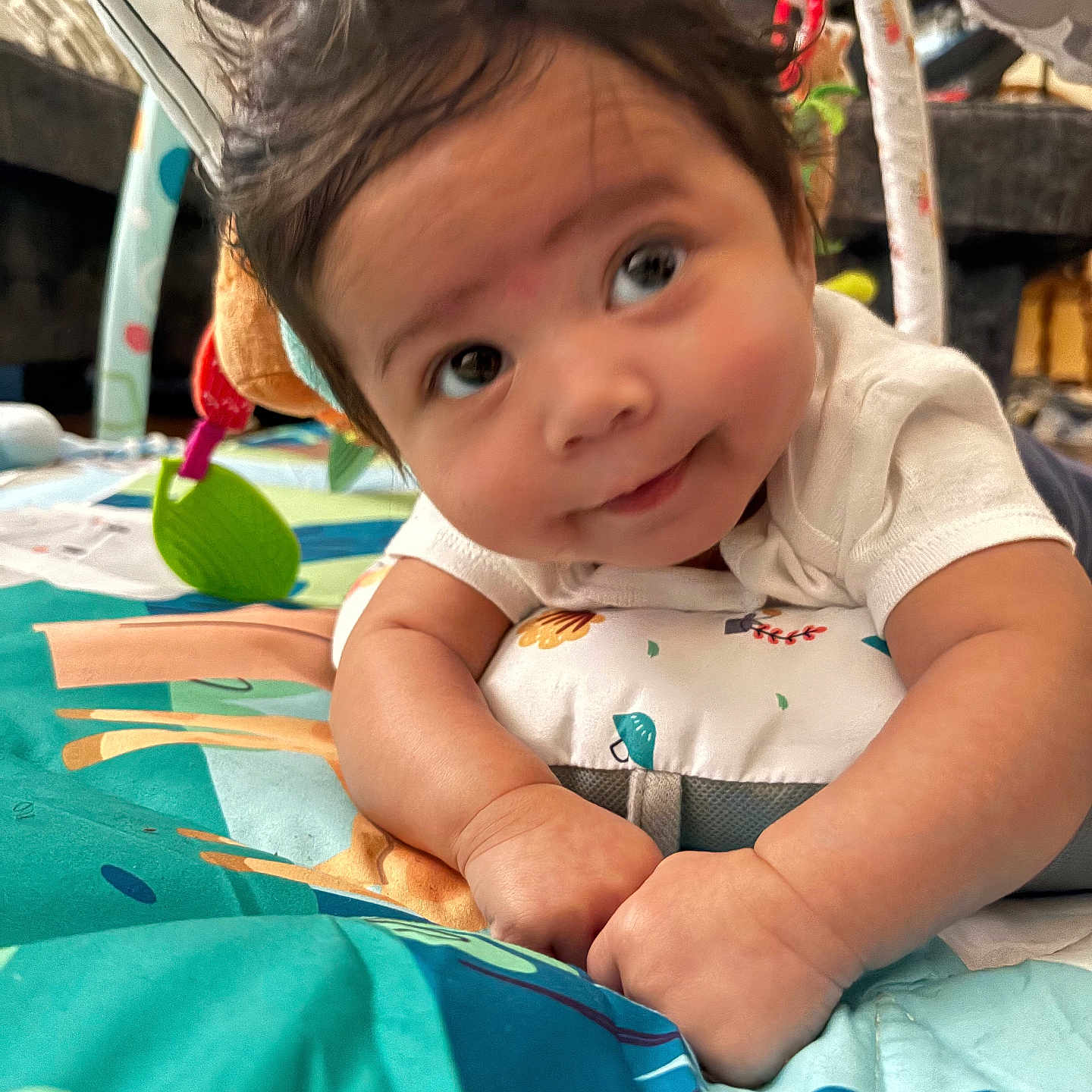 Elijah is registered to the contest to win money with this photo: architecture, baby, bodypart, building, clothing, cushion, dress, face, finger, furniture, hand, happy, head, homedecor, hospital, indoors, person, photography, portrait, smile