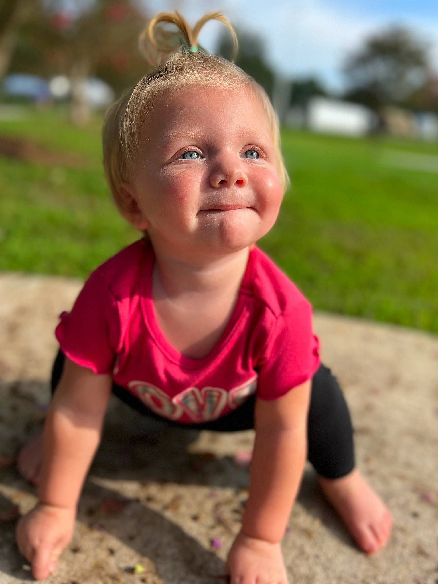 Ansley is registered to the contest to win money with this photo: baby, baby_toddler_clothing, child, city, flooring, fun, grass, happy, jewellery, leisure, people, people_in_nature, person, pink, recreation, sitting, sleeve, soil, summer, t_shirt