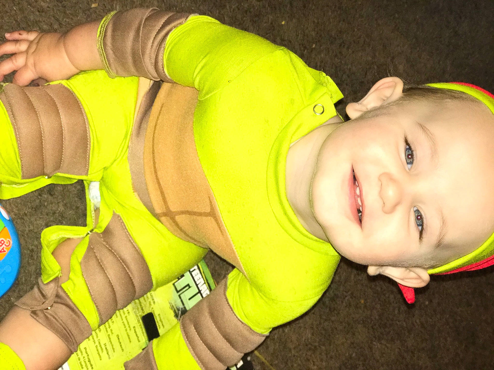 Tripp joined the competition — help win amazing prizes! baby, baby_laughing, baby_products, baby_toddler_clothing, child, flash_photography, fun, grass, happy, high_visibility_clothing, joy, organ, pattern, person, personal_protective_equipment, portrait_photography, product, sleeve, smile, toddler