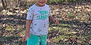 Raziel And Kairo joined the competition — help win amazing prizes! boy, child, clothing, daylight, grass, happy, leaves, nature, outdoor, person, portrait, shoes, shorts, smiling, sneakers, standing, sunlight, toddler, trees, tshirt