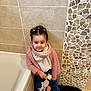 architecture, bathing, bathtub, building, child, clothing, face, female, girl, head, jeans, pants, person, photography, portrait, sitting, sleeve, toy, tub, wall