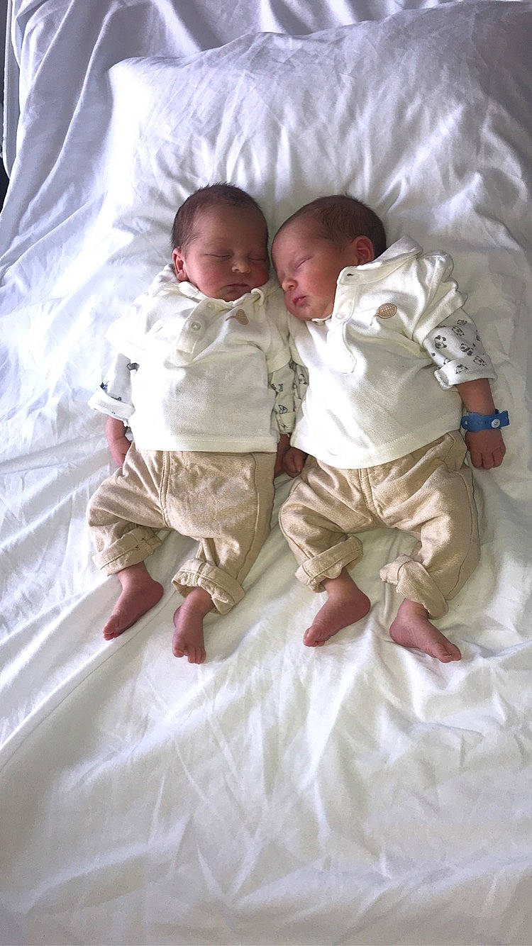 Angelo Gabriel participe au concours pour gagner de l'argent avec cette photo : abdomen, baby, baby_sleeping, baby_toddler_clothing, bed_sheet, bedding, bedtime, child, comfort, fun, gesture, happy, linens, peach, person, room, sitting, sleeve, t_shirt, throw_pillow