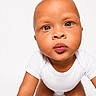 baby, child, crawling, white_background, onesie, curious, face, portrait, infant, closeup, cute, skin, head, eyes, expression, person, studio, young, front_view, indoor