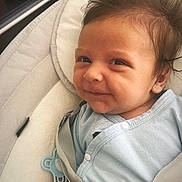 Damjan participe au concours pour gagner de l'argent avec cette photo : baby, smile, infant, face, hair, baby_seat, clothing, pacifier, strap, hand, indoors, cute, expression, skin, child, person, seat, fabric, comfort, portrait