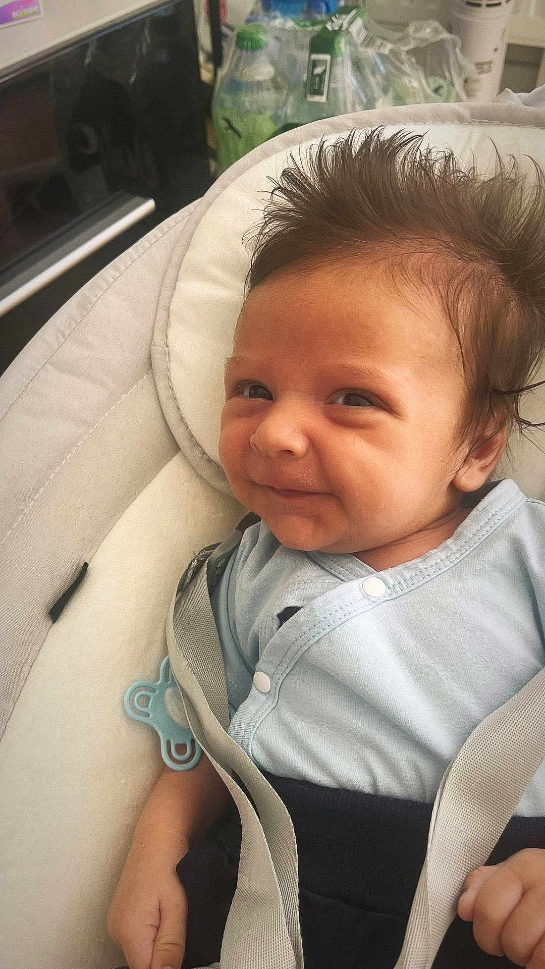 Damjan participe au concours pour gagner de l'argent avec cette photo : baby, smile, infant, face, hair, baby_seat, clothing, pacifier, strap, hand, indoors, cute, expression, skin, child, person, seat, fabric, comfort, portrait