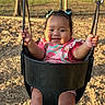 baby, child, clothing, cute, daytime, hands, happy, nature, outdoor, park, person, pigtails, pink, playground, seat, smile, sunlight, swing, toddler, woodchips
