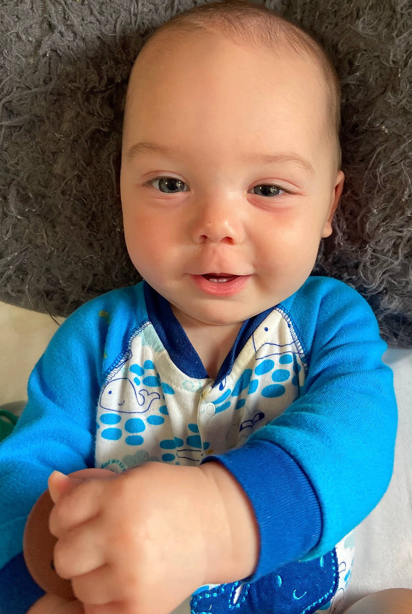 Brayden is registered to the contest to win money with this photo: arm, azure, blue, cheek, chin, eye, eyebrow, face, hair, hand, head, human_body, iris, lip, mouth, neck, nose, person, skin, sleeve