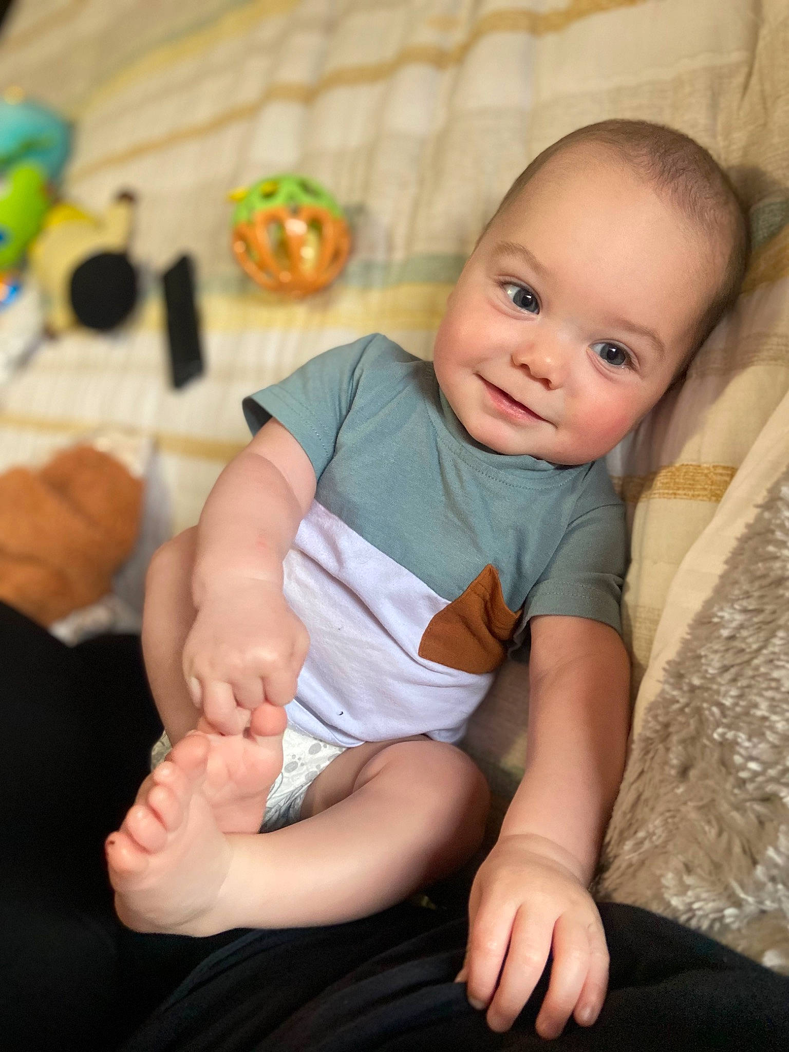 Brayden is registered to the contest to win money with this photo: arm, baby, baby_toddler_clothing, cheek, child, comfort, finger, flash_photography, fun, gesture, happy, human_body, human_leg, joy, knee, person, shorts, sitting, skin, smile