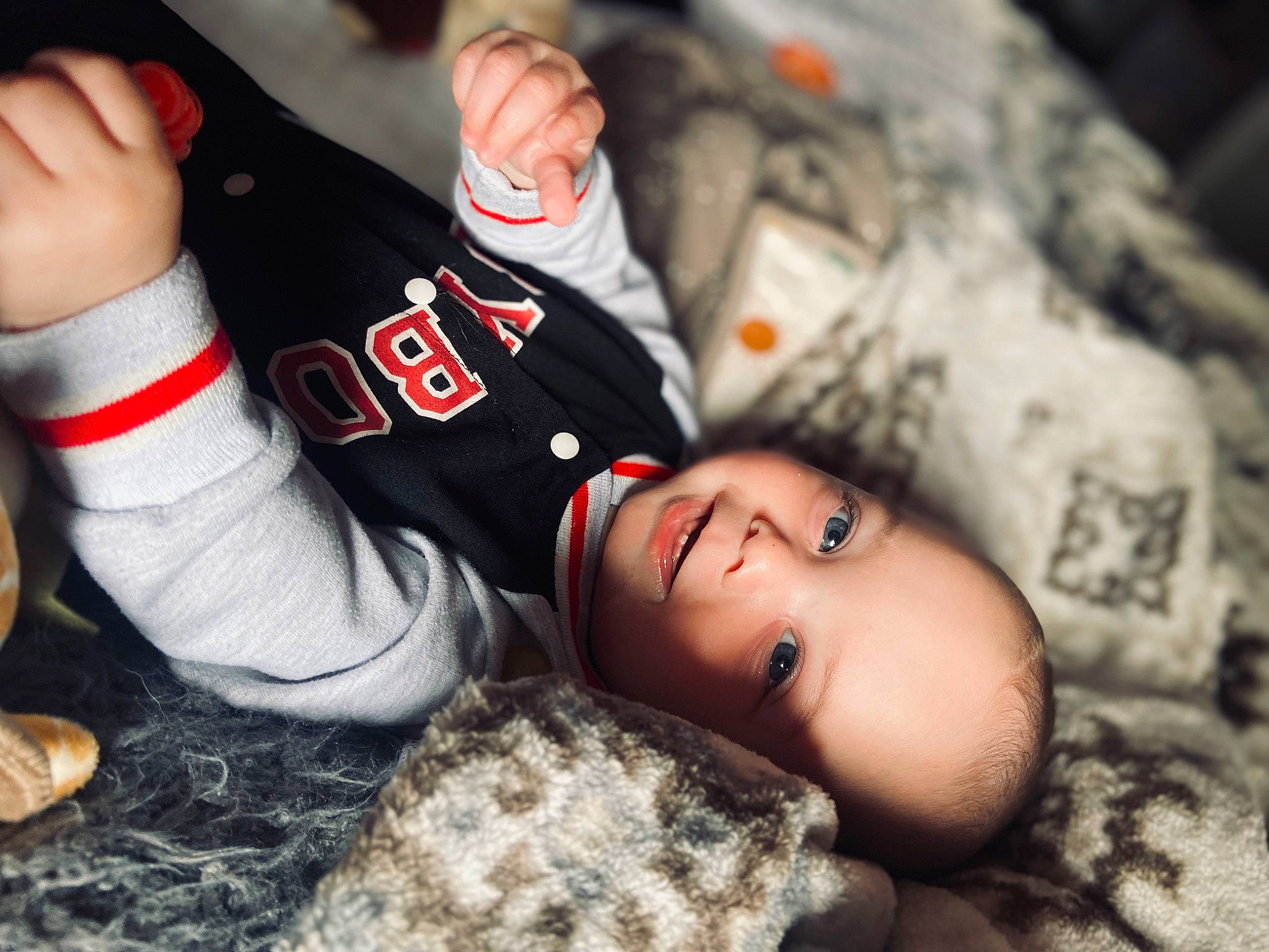 Brayden joined the competition — help win amazing prizes! black_hair, child, comfort, cool, elbow, flash_photography, flooring, fun, gesture, grass, happy, human_body, human_leg, joint, knee, leg, person, sitting, sportswear, thigh