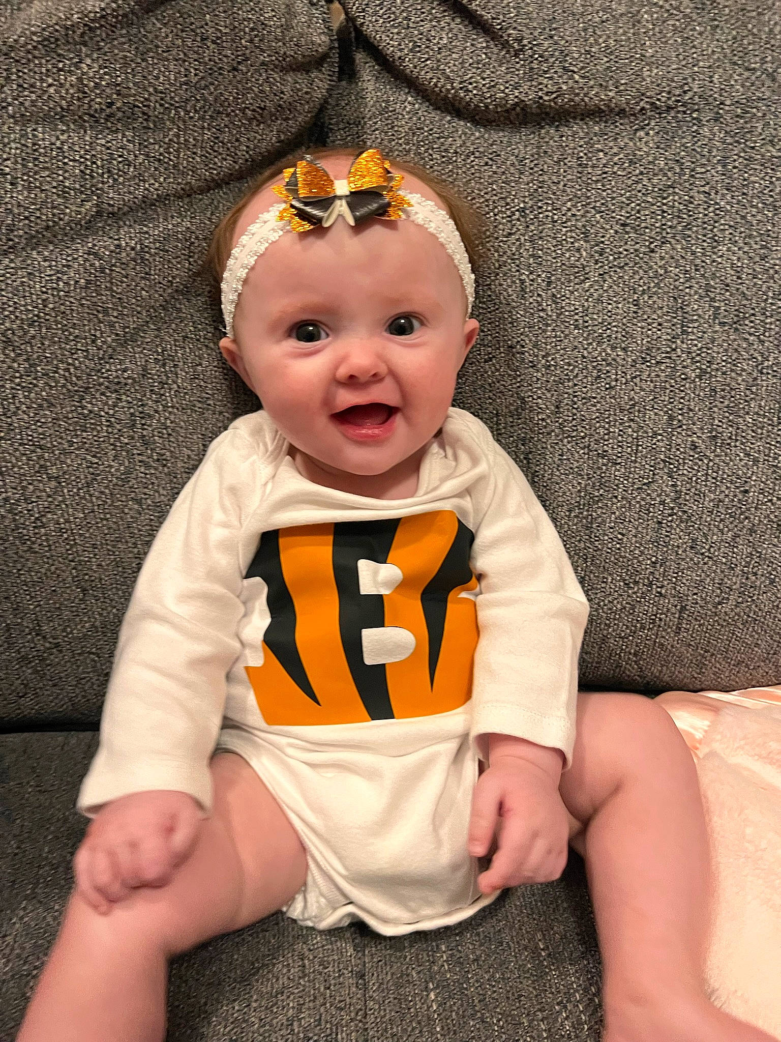 Lilyana joined the competition — help win amazing prizes! baby, baby_products, baby_sleeping, baby_toddler_clothing, cheek, child, comfort, costume, eye, face, happy, head, human_body, iris, linens, orange, person, sleeve, smile, t_shirt