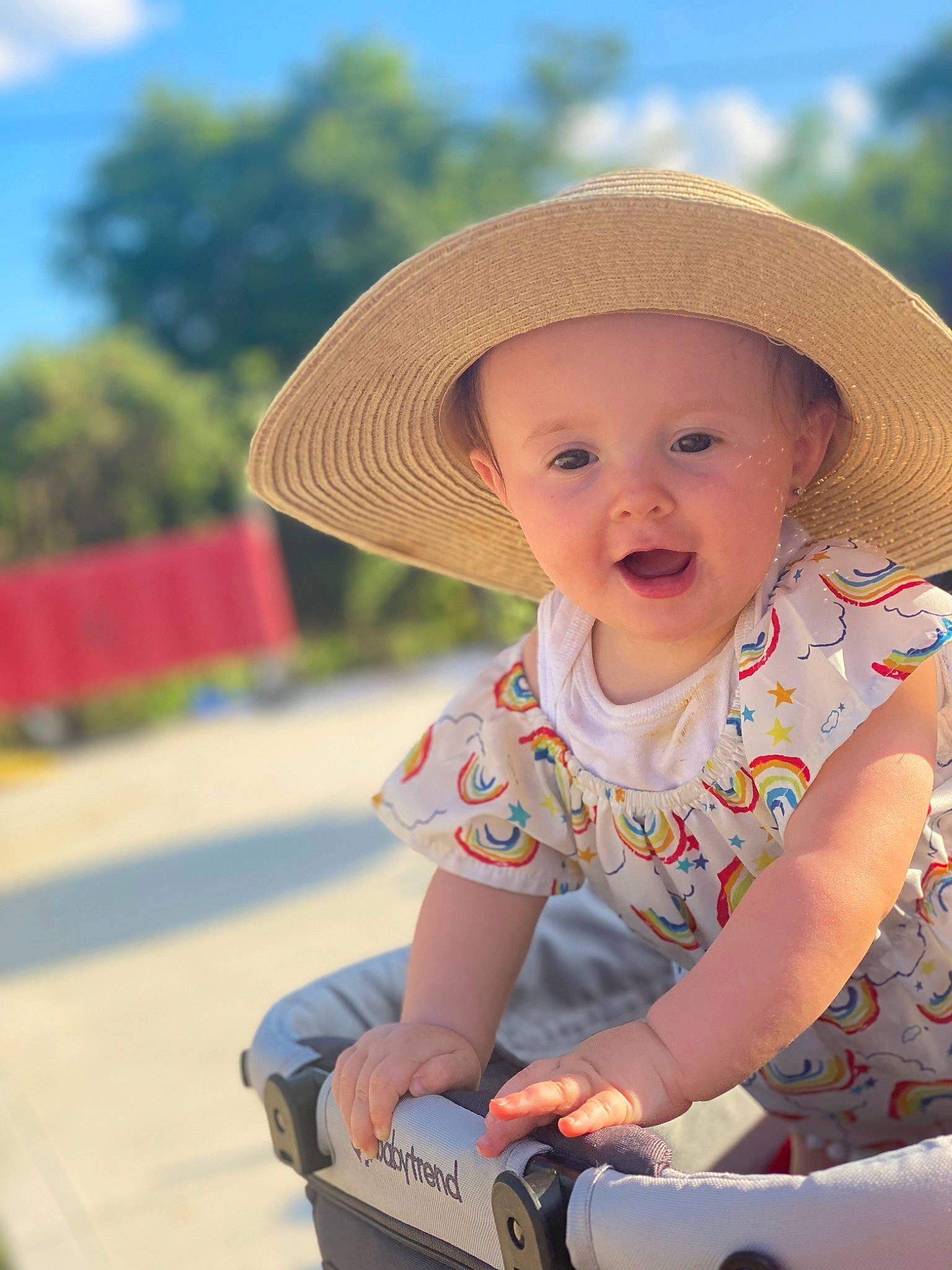 Lilyana joined the competition — help win amazing prizes! baby, baby_toddler_clothing, child, fun, grass, happy, hat, headgear, headwear, leisure, pattern, person, photograph, plant, sitting, skin, sky, sleeve, smile, sun_hat