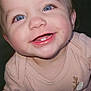 Lillian joined the competition — help win amazing prizes! baby, child, smiling, blue_eyes, pink_onesie, reindeer_design, crawling, close_up, face, tooth, happy, infant, cute, indoors, carpet, head, person, skin, eyelash, cheek