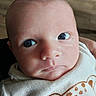 Esteban participe au concours pour gagner de l'argent avec cette photo : baby, newborn, face, eyes, clothing, infant, portrait, cute, expression, skin, head, person, child, white, sleeve, soft, indoors, human, apparel, wearing