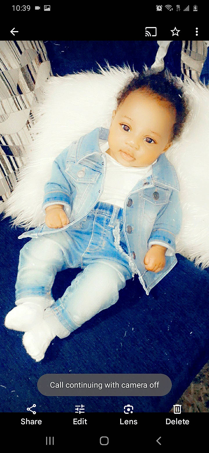 Adoree is registered to the contest to win money with this photo: baby, baby_products, baby_toddler_clothing, blue, cheek, child, denim, electric_blue, flash_photography, fun, fur, hair, happy, head, person, photo_shoot, portrait_photography, sitting, sleeve, textile