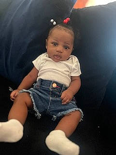 Adoree joined the competition — help win amazing prizes! baby, baby_toddler_clothing, cheek, comfort, elbow, electric_blue, fun, happy, human_body, human_leg, iris, knee, lap, mouth, person, sitting, sleeve, thigh, thumb, toddler