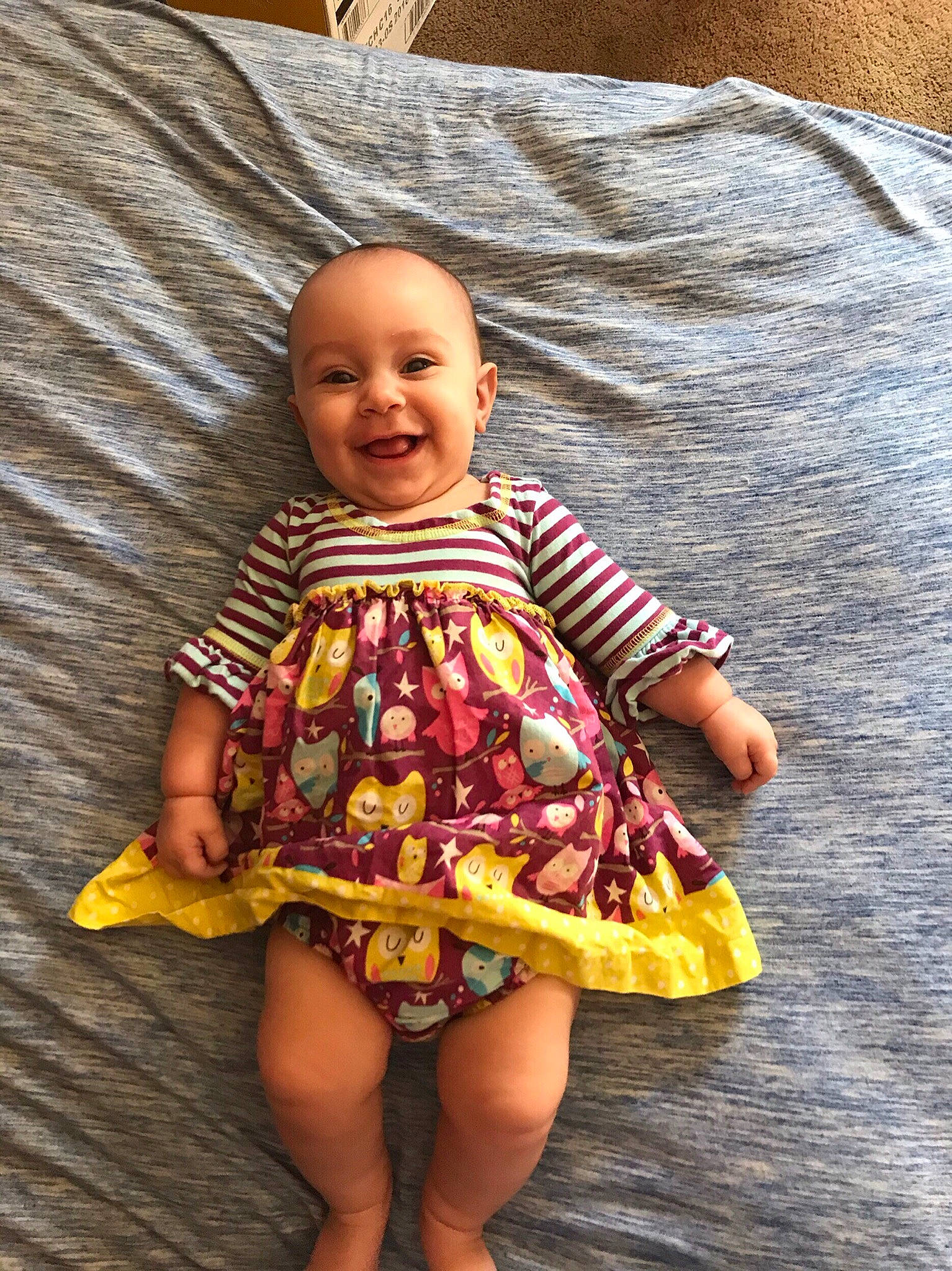 Aviana is registered to the contest to win money with this photo: baby, baby_products, baby_toddler_clothing, child, joy, pattern, person, play, sitting, smile, toddler