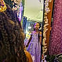 braided_hair, child, curtains, decor, dress, flower_garland, girl, greenery, indoor, lamp, mirror, pink_flowers, plants, playful, portrait, pout, princess_dress, reflection, room, tiara