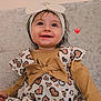 Carla joined the competition — help win amazing prizes! baby, child, smiling, headband, bow, dress, heart_pattern, long_sleeves, sitting, happy, indoors, cute, portrait, toddler, clothing, texture, pink, white, skin, person