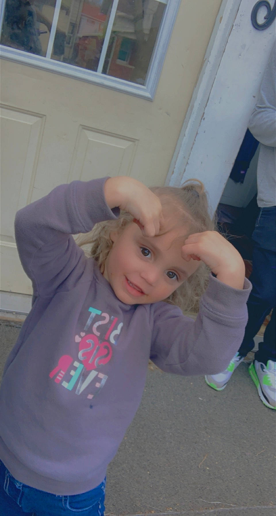 Lia is registered to the contest to win money with this photo: arm, baby, chair, child, elbow, finger, fun, gesture, happy, headwear, joint, leisure, person, picture_frame, room, shoulder, sitting, sleeve, smile, t_shirt