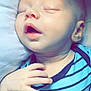 baby, sleeping, infant, onesie, hand, pillow, pacifier, face, mouth, peaceful, closeup, child, newborn, resting, skin, head, striped_clothing, cute, indoors, soft