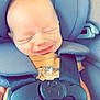 baby, car_seat, smiling, infant, pacifier, blue, straps, child, happy, seatbelt, closeup, cute, safety, toddler, headrest, soft, clothing, infant_toddler, face, relaxing