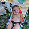 baby, child, stroller, outdoor, grass, wood, bucket, seat, cute, chubby, expression, person, infant, summer, sunlight, diaper, legs, face, playful, nature