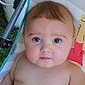 Kamden is registered to the contest to win money with this photo: baby, child, face, eyes, hair, skin, infant, portrait, close_up, sitting, seat, outdoor, colorful, expression, chubby, cute, young, person, human, head