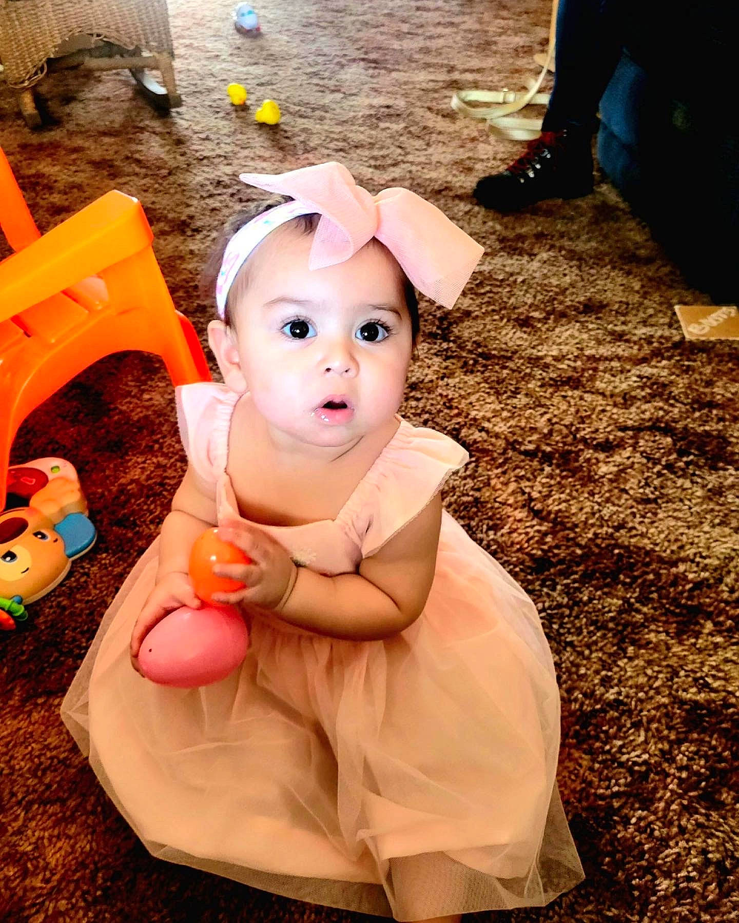 Xyla joined the competition — help win amazing prizes! baby, baby_toddler_clothing, child, facial_expression, finger, fun, grass, happy, hat, head, leg, leisure, people, person, pink, recreation, sitting, skin, surprise, toddler