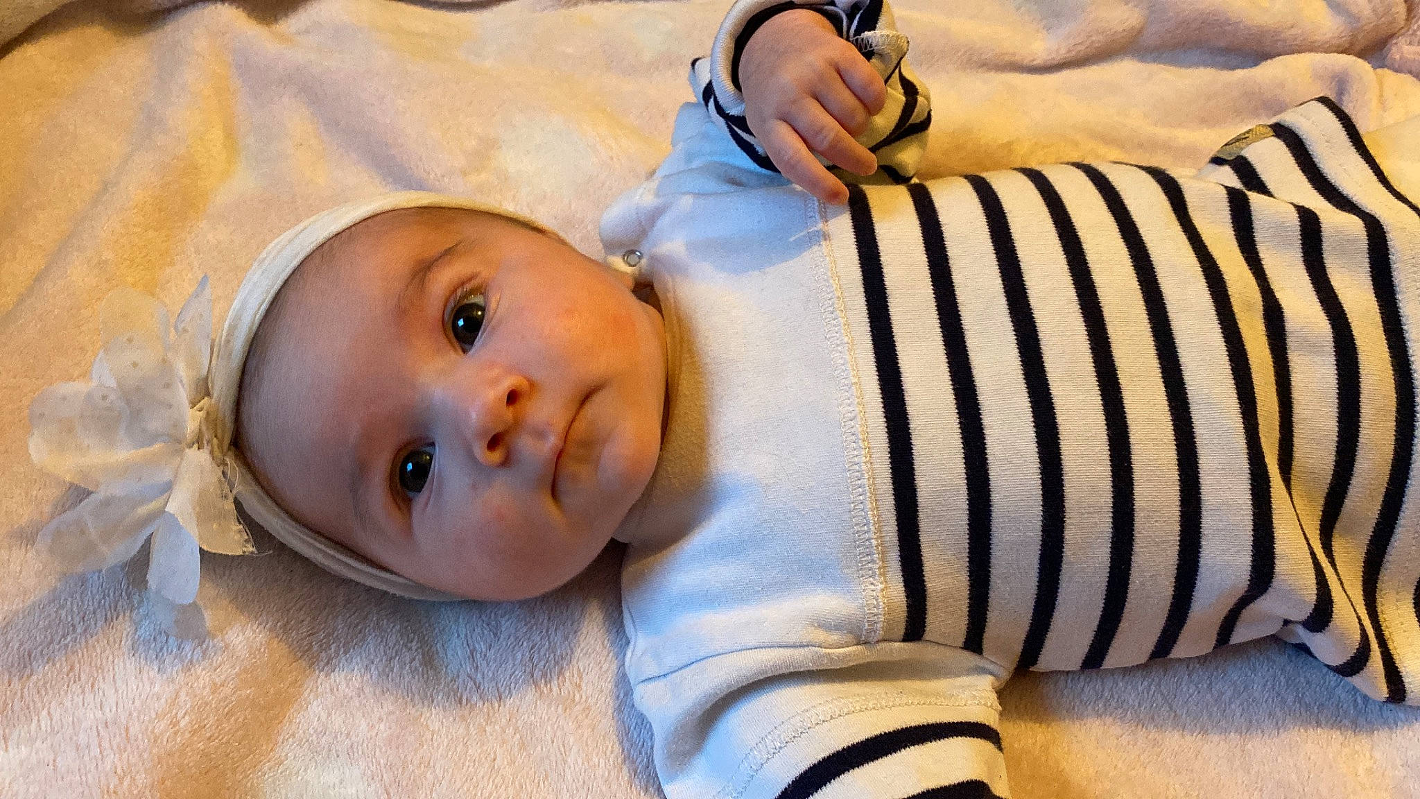 Margot participe au concours pour gagner de l'argent avec cette photo : baby, baby_sleeping, baby_toddler_clothing, cheek, child, comfort, eye, face, happy, headwear, human_body, lip, mammal, mouth, nose, person, skin, sleeve, textile, toddler