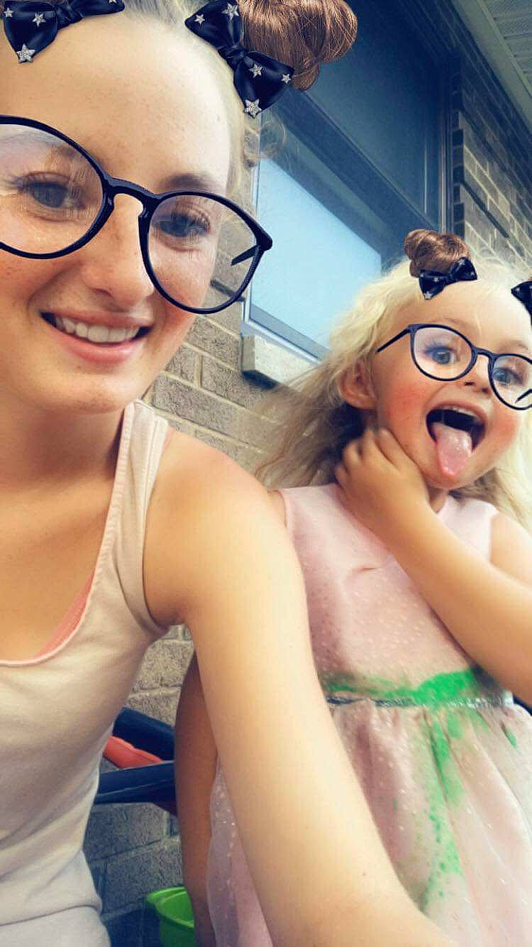 Roxy is registered to the contest to win money with this photo: black_hair, brown_hair, cool, eyewear, fun, girl, glasses, happiness, headwear, joy, lip, person, selfie, smile, sunglasses, vision_care