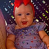 baby, child, smiling, headband, red_bow, striped_dress, seated, happy, face, arms, blue_eyes, infant, cute, portrait, indoors, colorful, clothing, person, young, head
