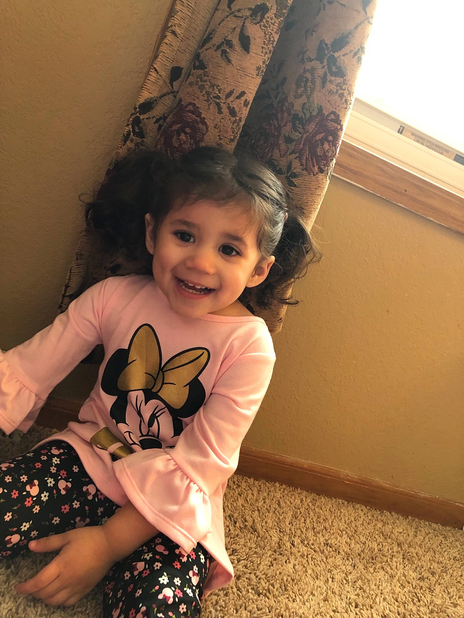 Alessandra is registered to the contest to win money with this photo: arm, child, ear, eye, face, fawn, fun, happy, head, human_body, human_leg, joy, leg, pattern, person, sitting, skin, smile, thigh, toddler