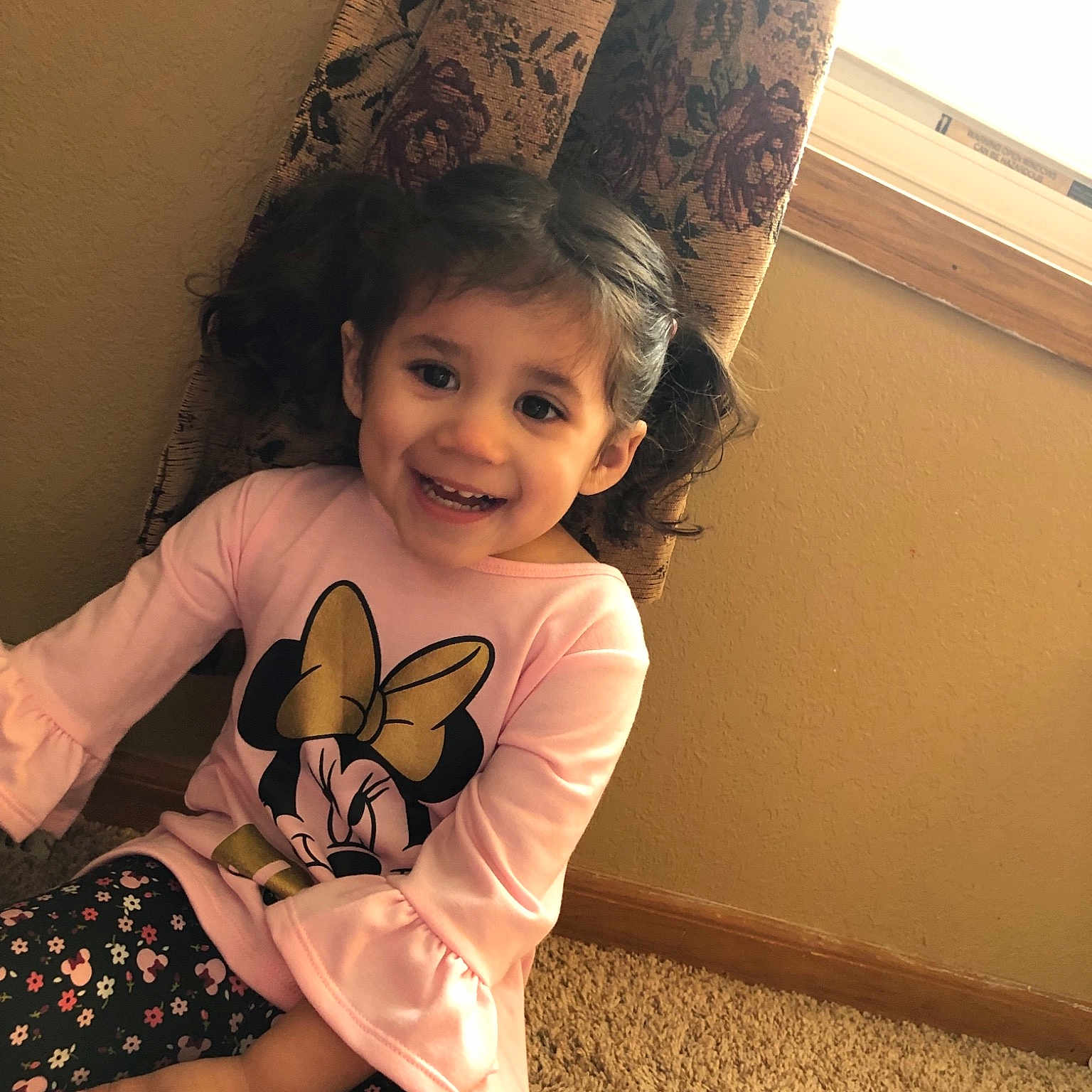 Alessandra is registered to the contest to win money with this photo: arm, child, ear, eye, face, fawn, fun, happy, head, human_body, human_leg, joy, leg, pattern, person, sitting, skin, smile, thigh, toddler