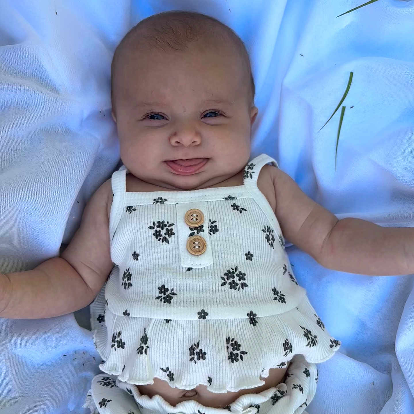 Hartleigh is registered to the contest to win money with this photo: baby, bed, blanket, clothing, cushion, dress, face, furniture, happy, head, homedecor, linen, newborn, pants, person, photography, portrait, quilt, smile, t_shirt