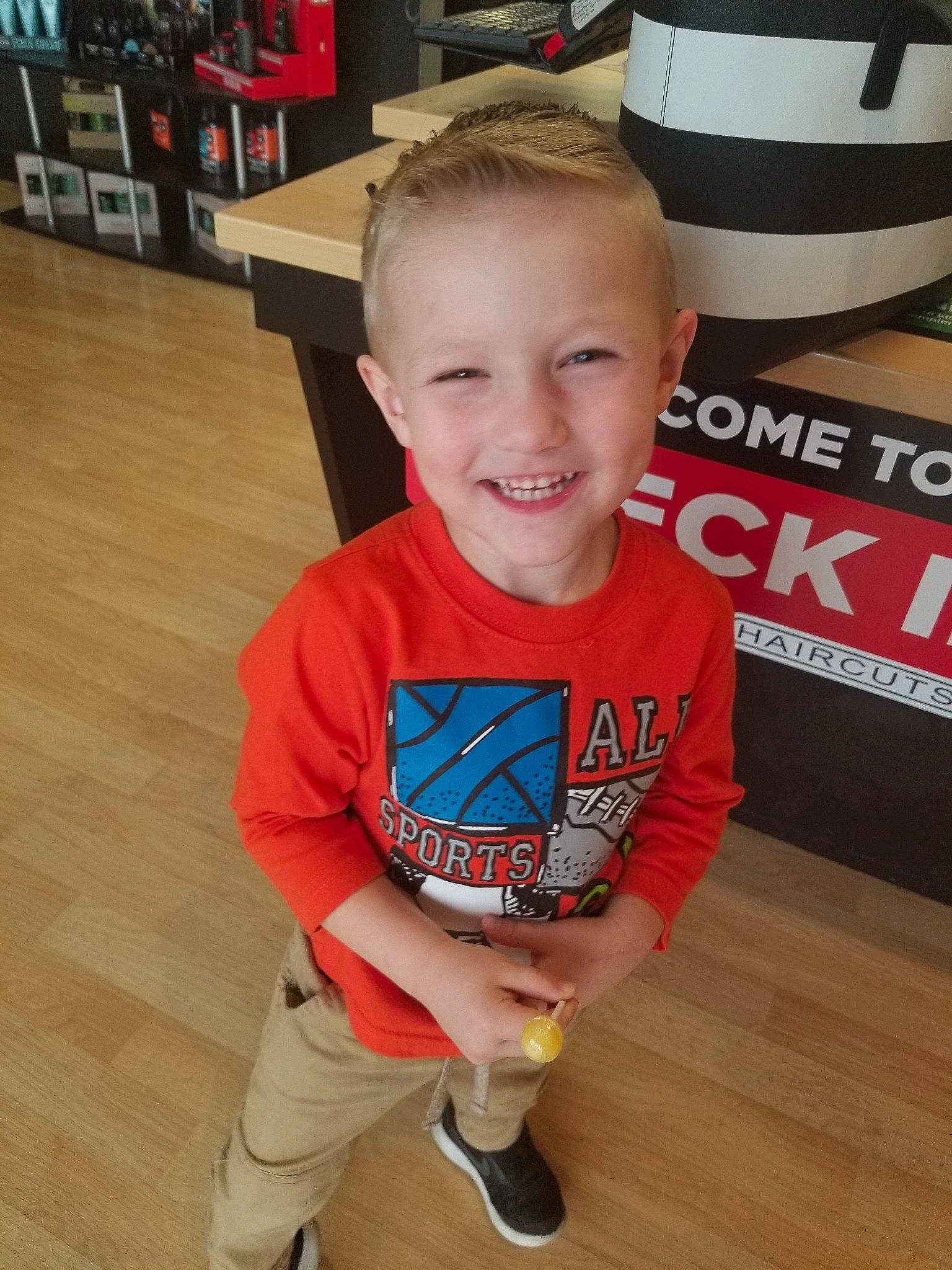 Greyson is registered to the contest to win money with this photo: arm, child, footwear, joy, person, play, shoe, smile, t_shirt, toddler