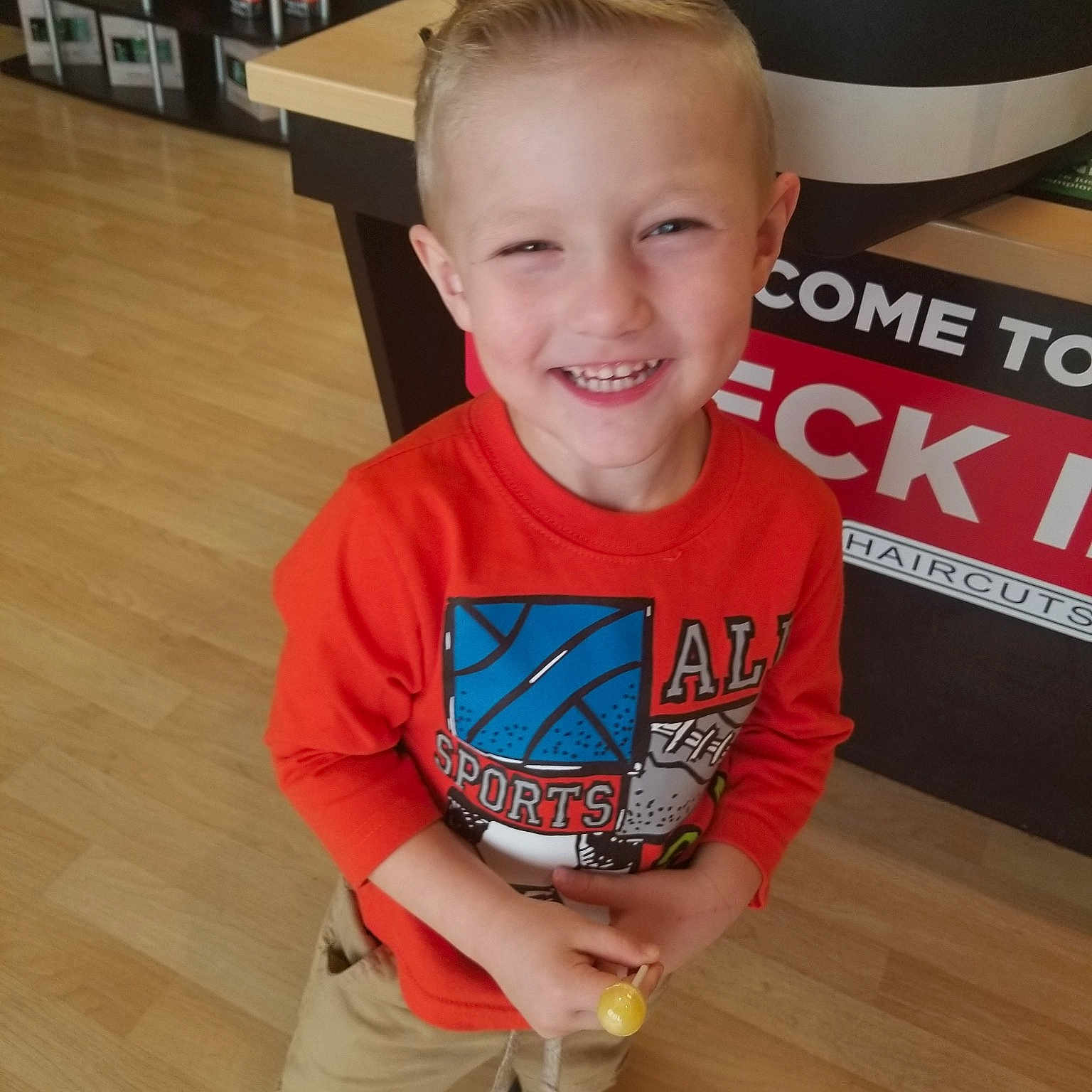 Greyson is registered to the contest to win money with this photo: arm, child, footwear, joy, person, play, shoe, smile, t_shirt, toddler