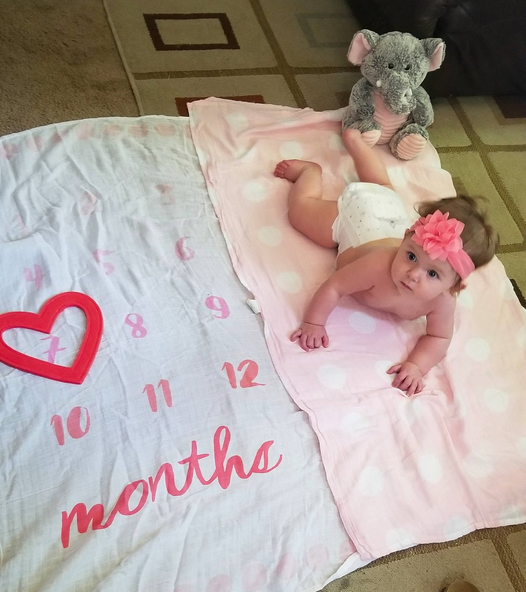 Meredith joined the competition — help win amazing prizes! bed_sheet, bedding, blanket, child, headwear, linens, person, pink, textile