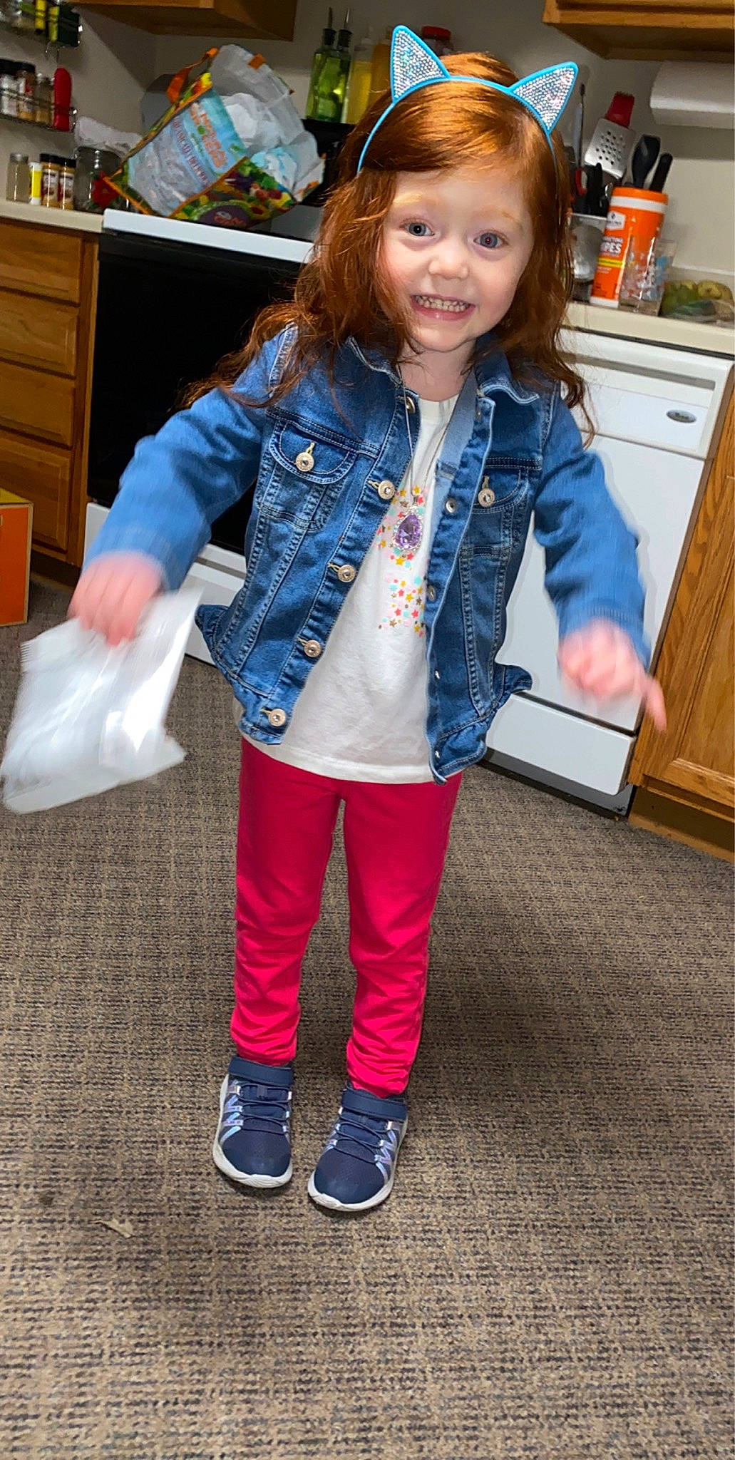 Madalynn is registered to the contest to win money with this photo: child, child_model, clothing, denim, footwear, jacket, jeans, joy, outerwear, person, pocket, shoe, sleeve, standing, textile, toddler, trousers
