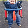 Ethan And Josh joined the competition — help win amazing prizes! toddler, child, swing, playground, blue_snowsuit, chains, outdoor, smile, happy, grass, fence, shoes, cold_weather, jacket, park, fun, baby, person, seat, play