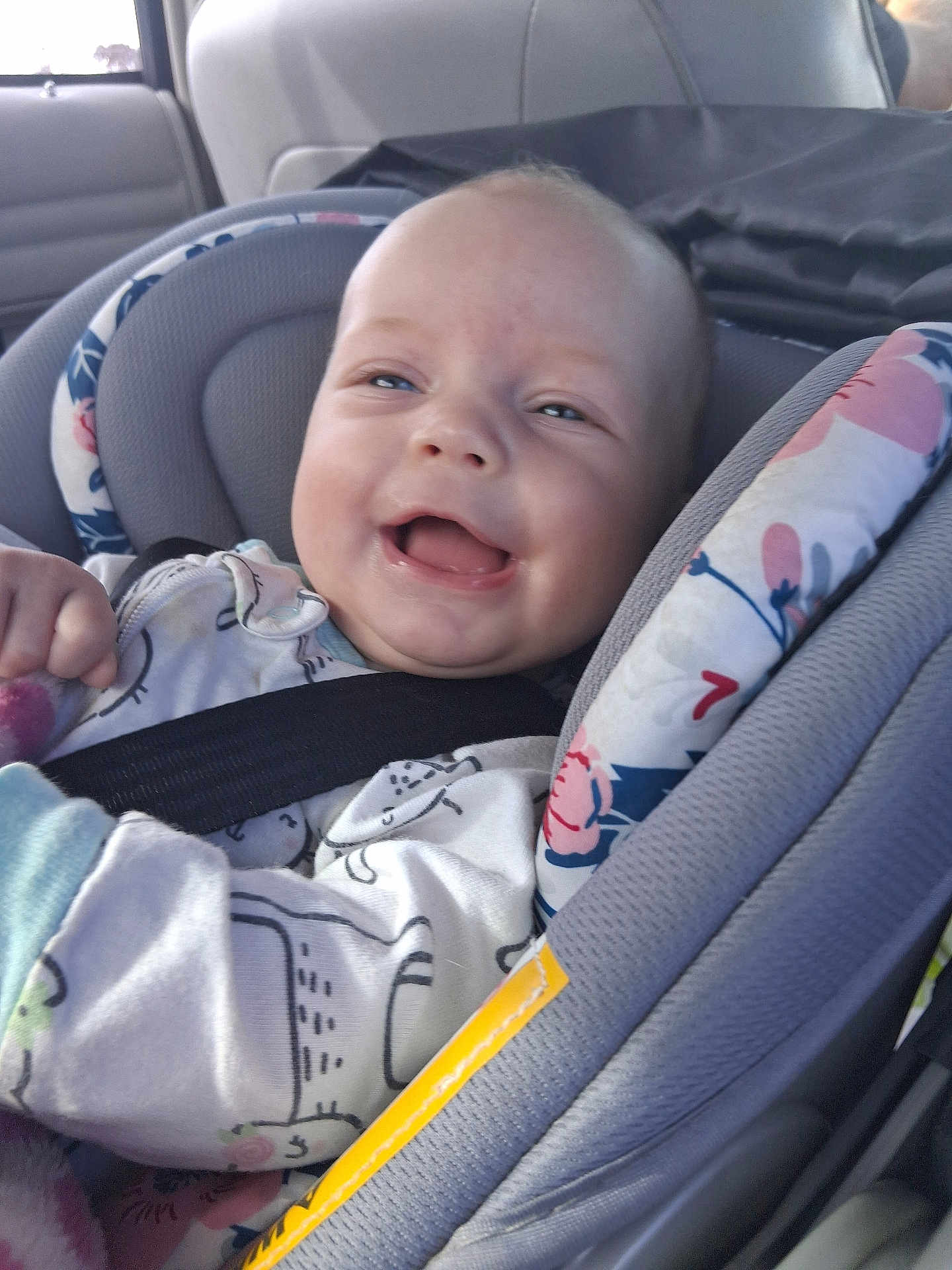 Skylynn is registered to the contest to win money with this photo: baby, car_seat, smile, infant, child, seatbelt, clothing, happy, portrait, person, interior, car, cushion, cute, young_child, seat, safety, child_in_car, infant_clothing, joy