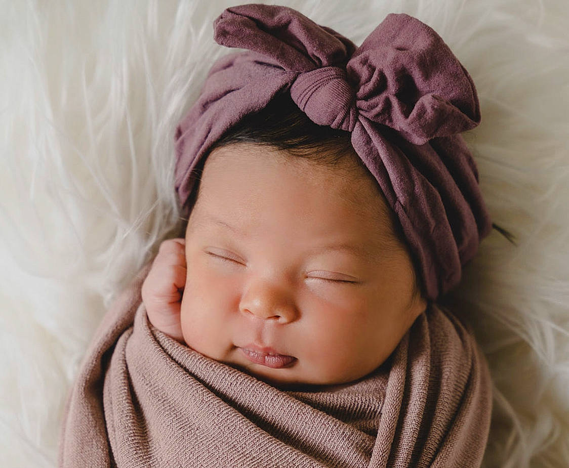 Teagan is registered to the contest to win money with this photo: baby, baby_toddler_clothing, cheek, chin, comfort, ear, eye, eyebrow, eyelash, face, forehead, head, headgear, iris, lip, nose, person, pink, product, skin