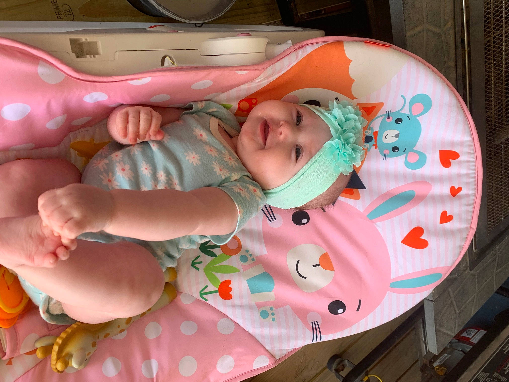 Lily Grace is registered to the contest to win money with this photo: baby, baby_products, baby_safety, baby_toddler_clothing, child, circle, comfort, headwear, linens, orange, pattern, peach, person, pink, product, room, smile, textile, thumb, toddler