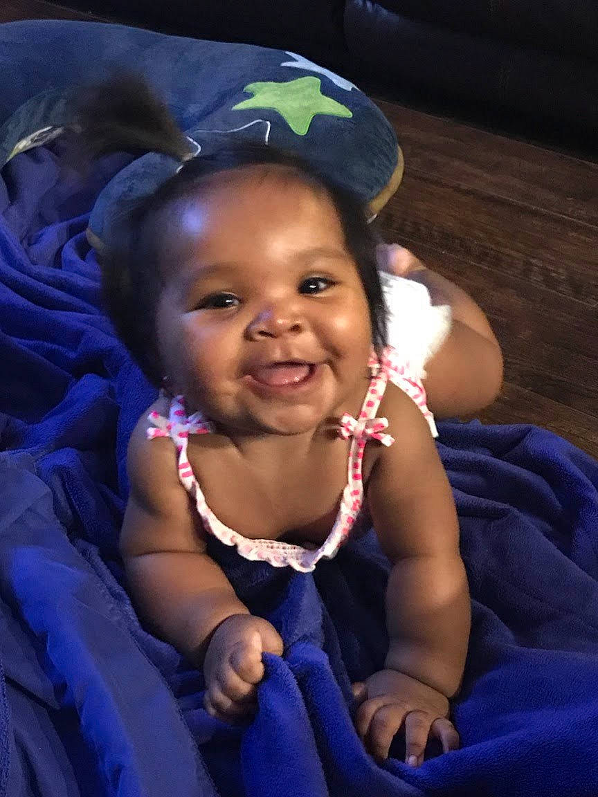 Journey joined the competition — help win amazing prizes! black_hair, blue, child, cool, day, emotion, eye, face, fun, girl, head, headgear, human, person, product, purple, sitting, skin, smile, toddler