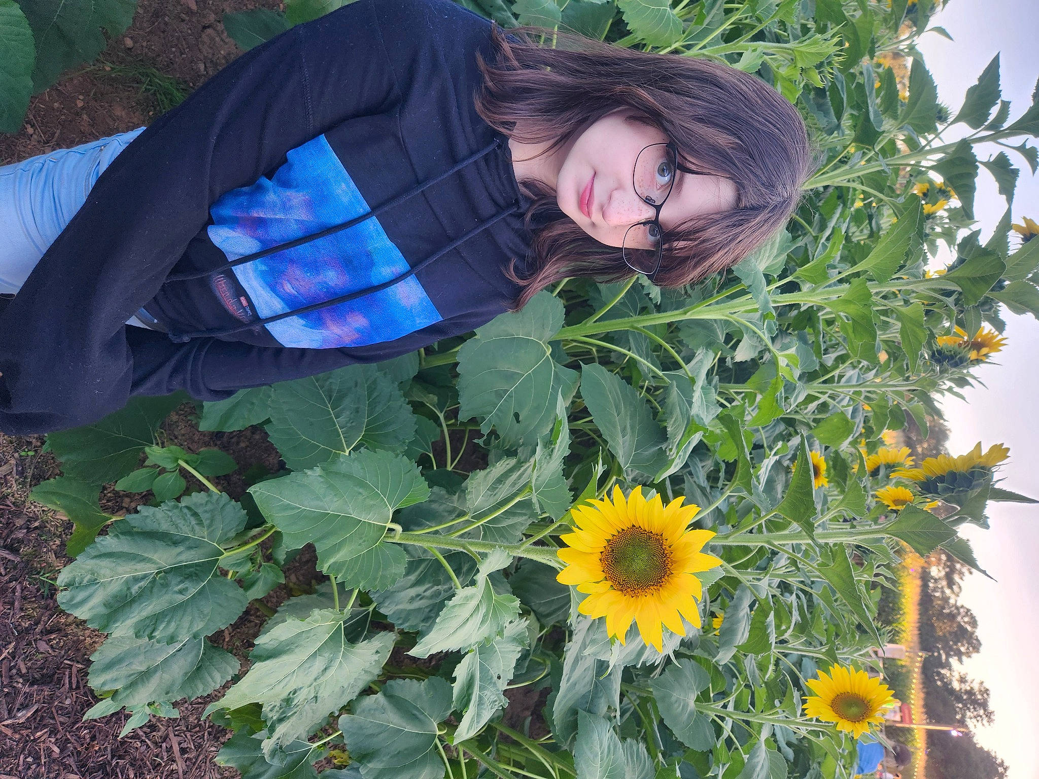 Hannelore joined the competition — help win amazing prizes! annual_plant, botany, eyewear, flower, flowering_plant, glasses, grass, happy, herb, people_in_nature, person, petal, plant, plantation, pollen, smile, sunflower, sunglasses, tree, wildflower