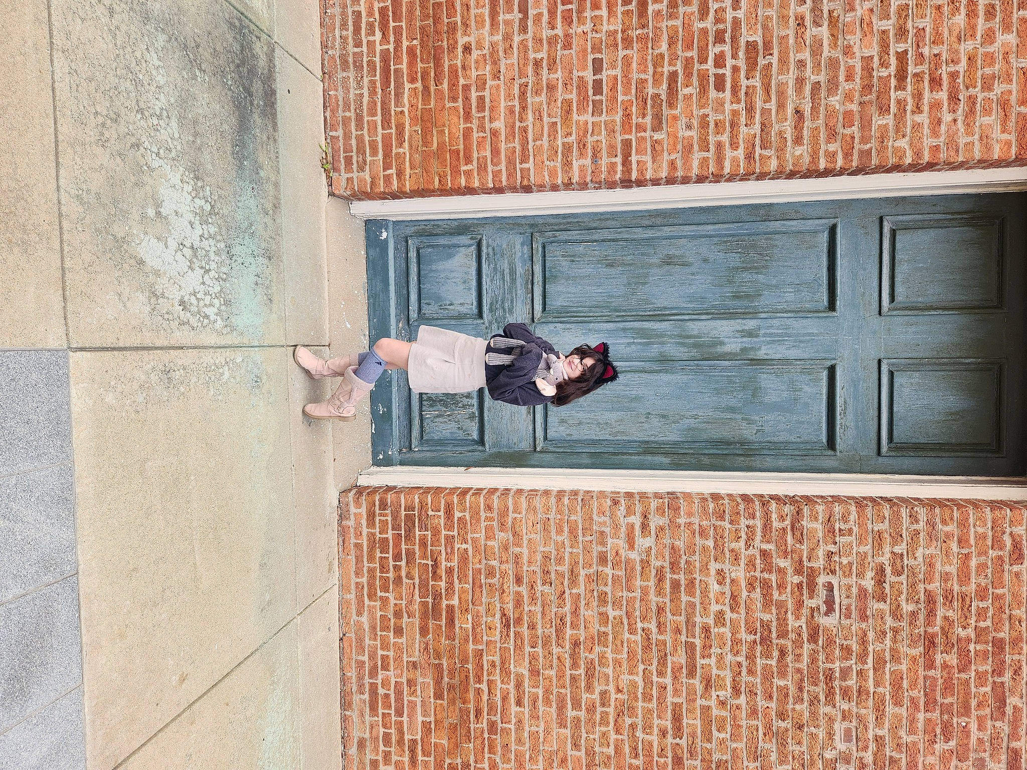 Hannelore joined the competition — help win amazing prizes! brick, brickwork, concrete, facade, floor, flooring, footwear, hardwood, jeans, joy, person, recreation, rectangle, road_surface, room, shadow, sitting, street, tree, window