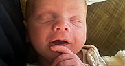 Asher joined the competition — help win amazing prizes! newborn, baby, sleeping, hand, blanket, couch, face, infant, peaceful, cozy, closeup, skin, portrait, young_child, indoors, relaxing, soft_light, resting, comfort, person