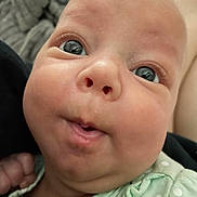 Emerson joined the competition — help win amazing prizes! baby, blue_eyes, child, chubby_cheeks, close_up, curious_expression, cute, face, head, human, indoors, infant, mint_green_clothing, newborn, person, polka_dots, portrait, skin, soft_background, young