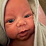 Emerson is registered to the contest to win money with this photo: baby, blanket, child, closeup, cute, expression, eyes, face, head, human, indoors, infant, mouth, newborn, portrait, skin, soft, towel, warm, wrapped