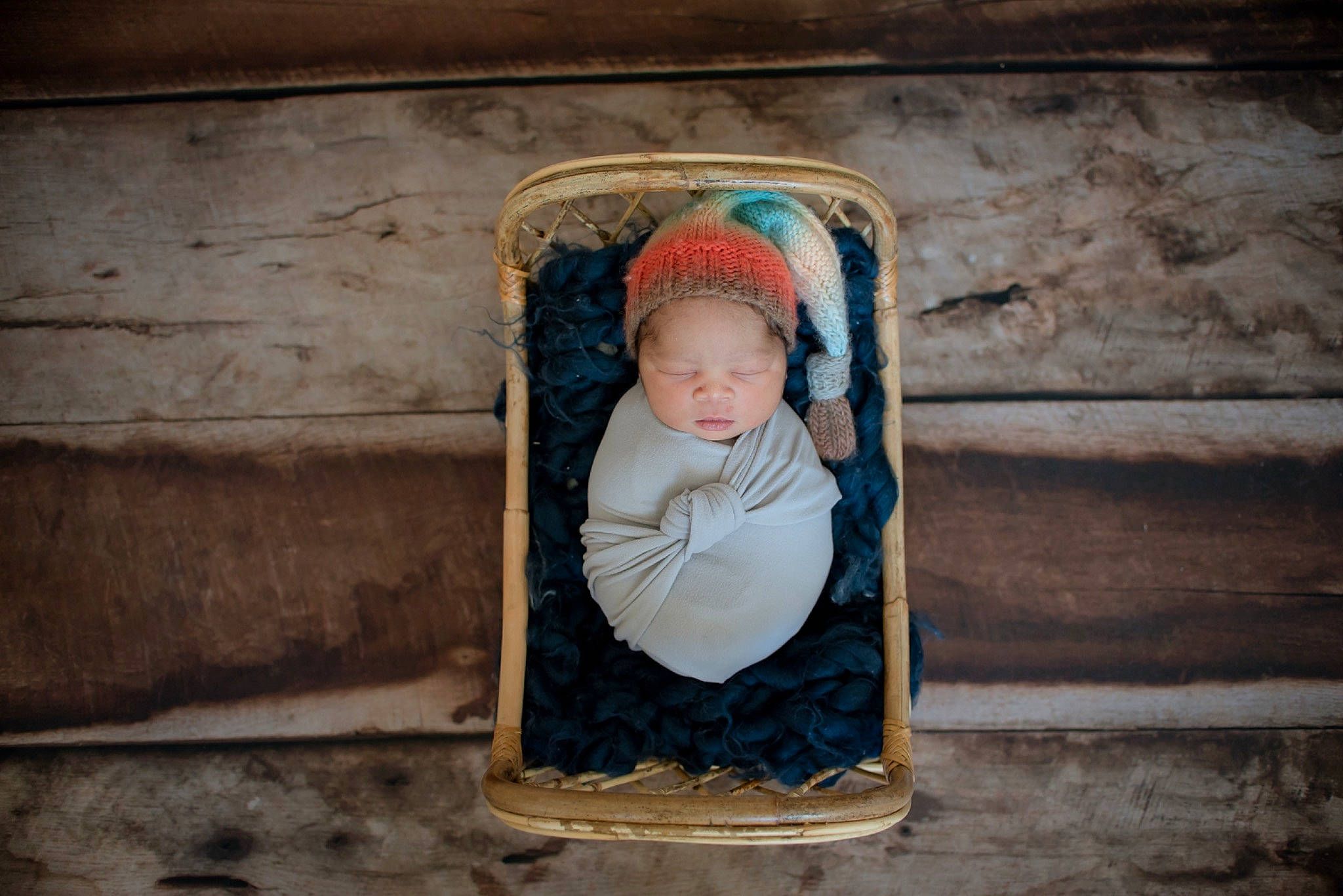 Zane is registered to the contest to win money with this photo: baby, baby_toddler_clothing, brick, child, concrete, eye, flooring, fun, grass, headgear, human_body, leisure, person, rectangle, sitting, sleeve, tints_and_shades, toddler, tree, winter