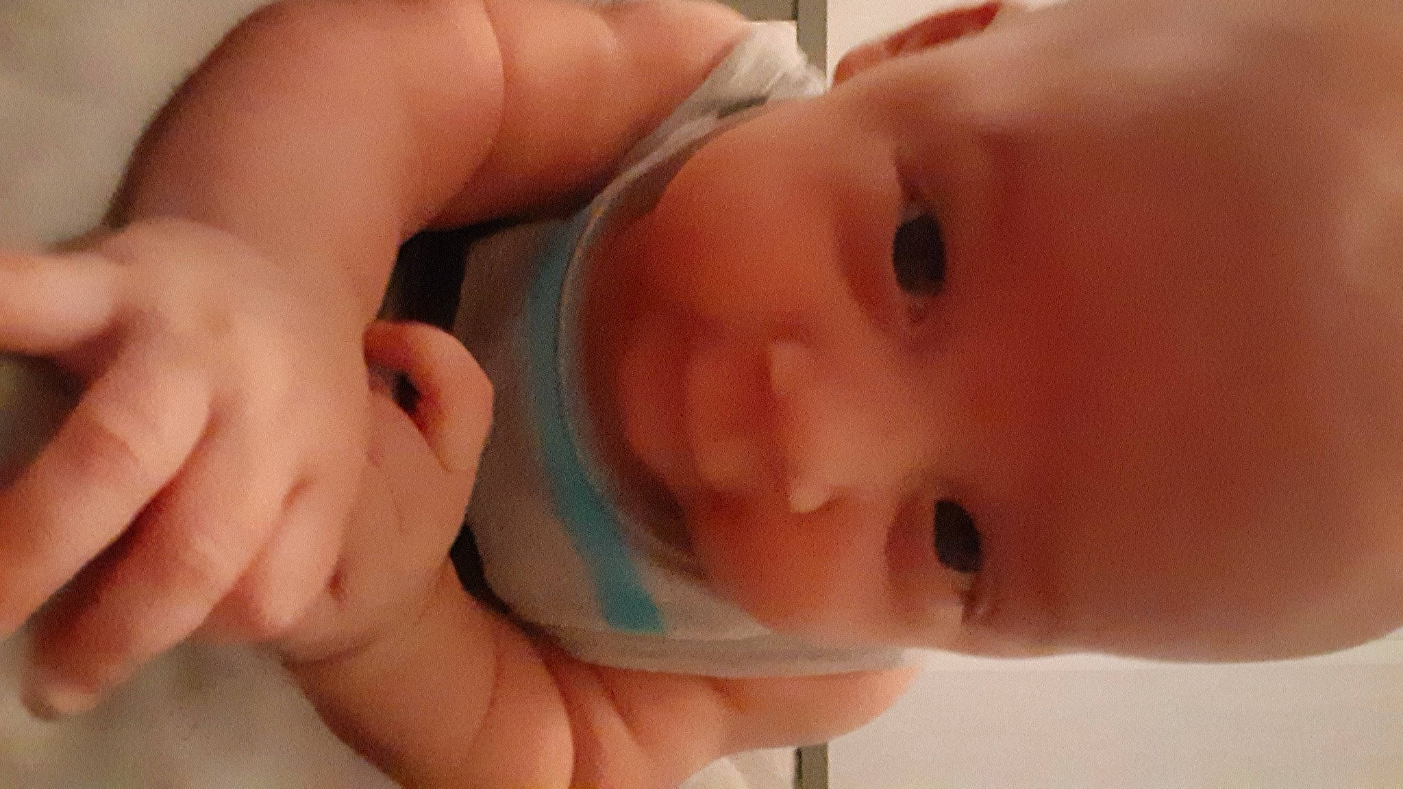 Devon is registered to the contest to win money with this photo: baby, bathing, cheek, child, chin, close_up, ear, eye, face, finger, forehead, hand, head, lip, mouth, muscle, nose, person, skin, thumb